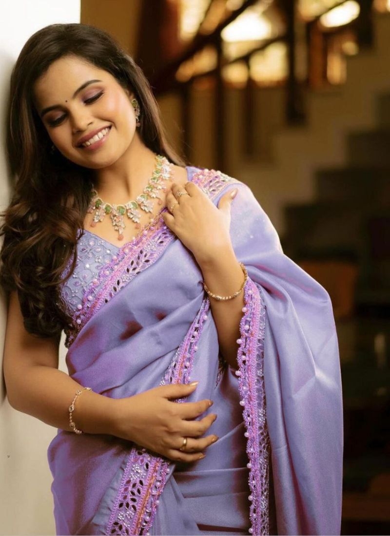 Trendy tissue silk saree with mirror work in light purple