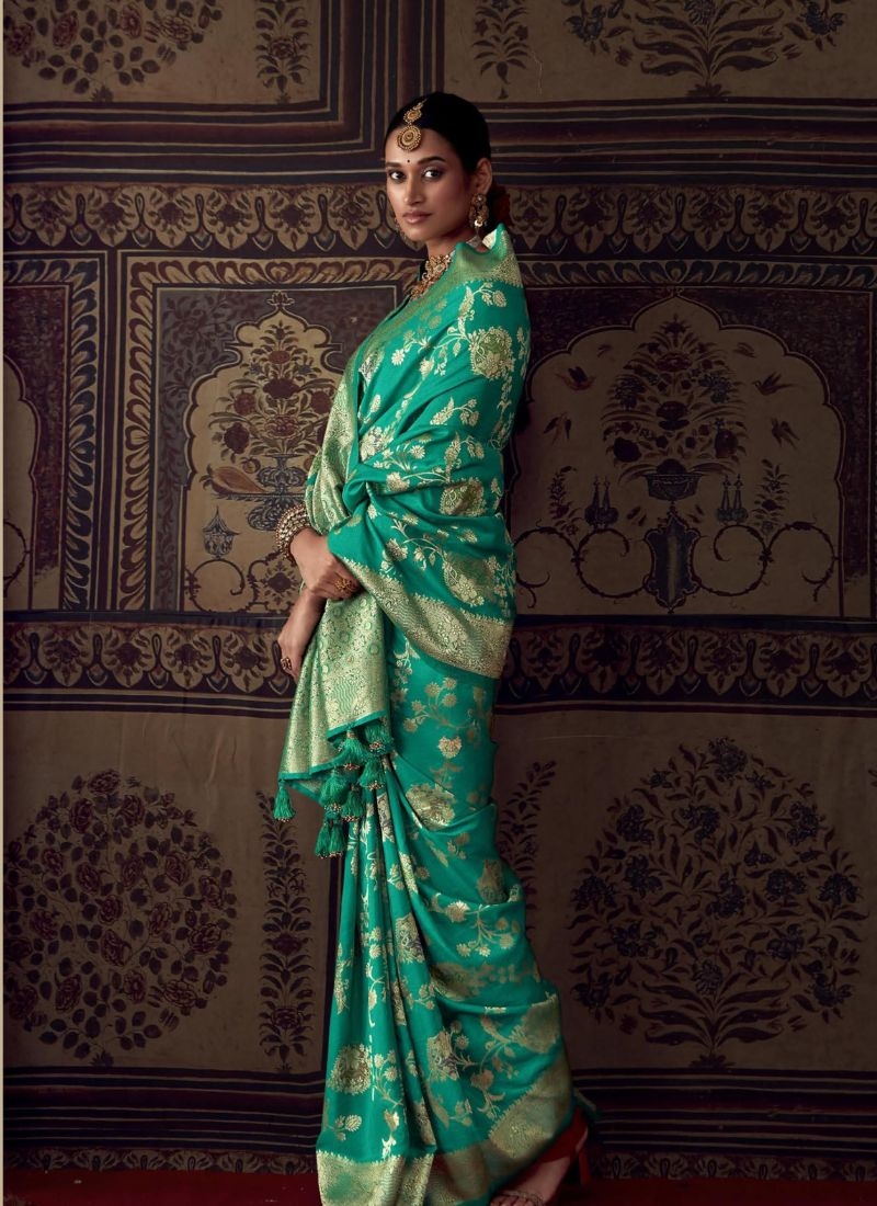 Pure dola silk saree with meenakari work in green