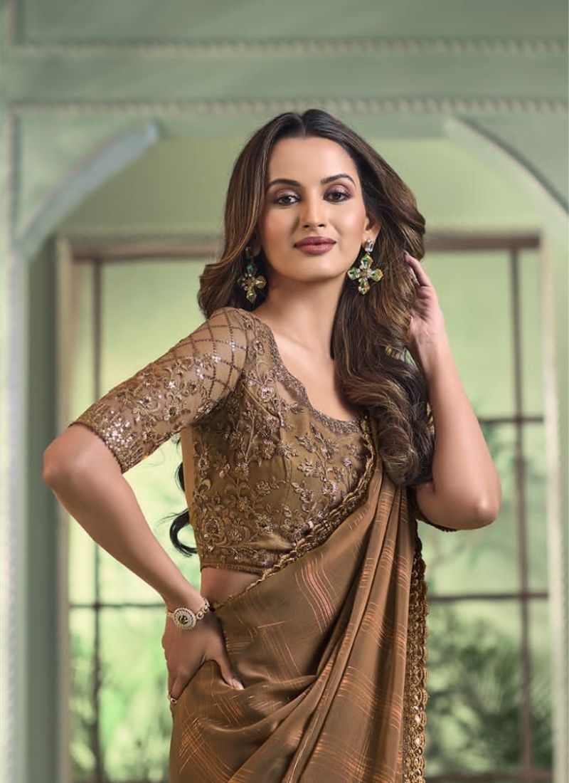 Premium designer saree with beautiful blouse in brown