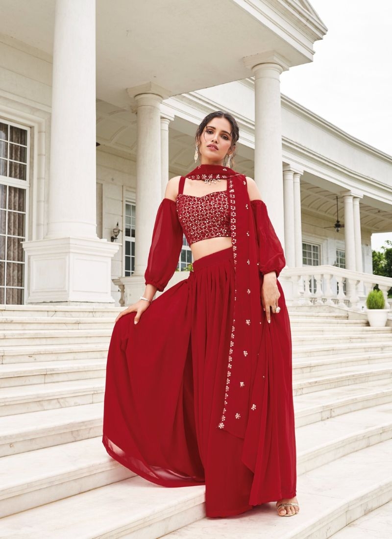 Trendy georgette lehenga with embroidered sleeve less blouse in red