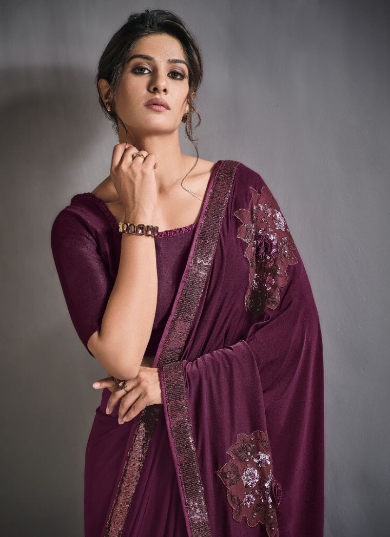 Exquisite wedding saree with embroidered blouse in wine