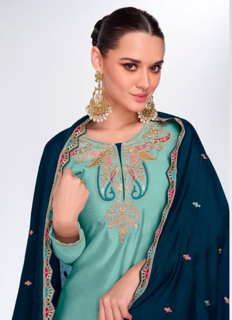 Beautiful sharara suit with heavy embroidery in green