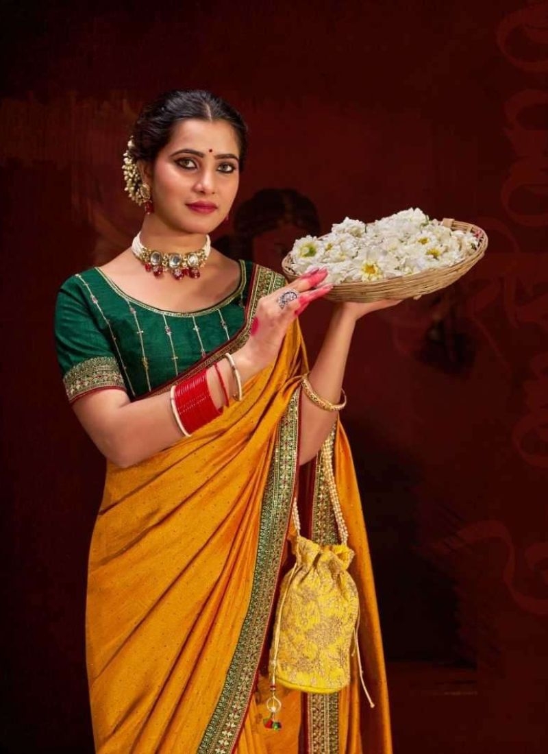 Trendy silk saree with beautifully embroidered blouse in yellow