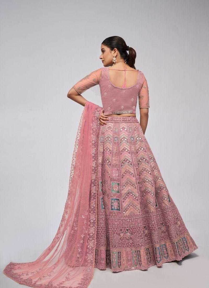 Beautiful patterns  zari embroidery in peacock and paisley motifs perfect bridal  lehenga in pink