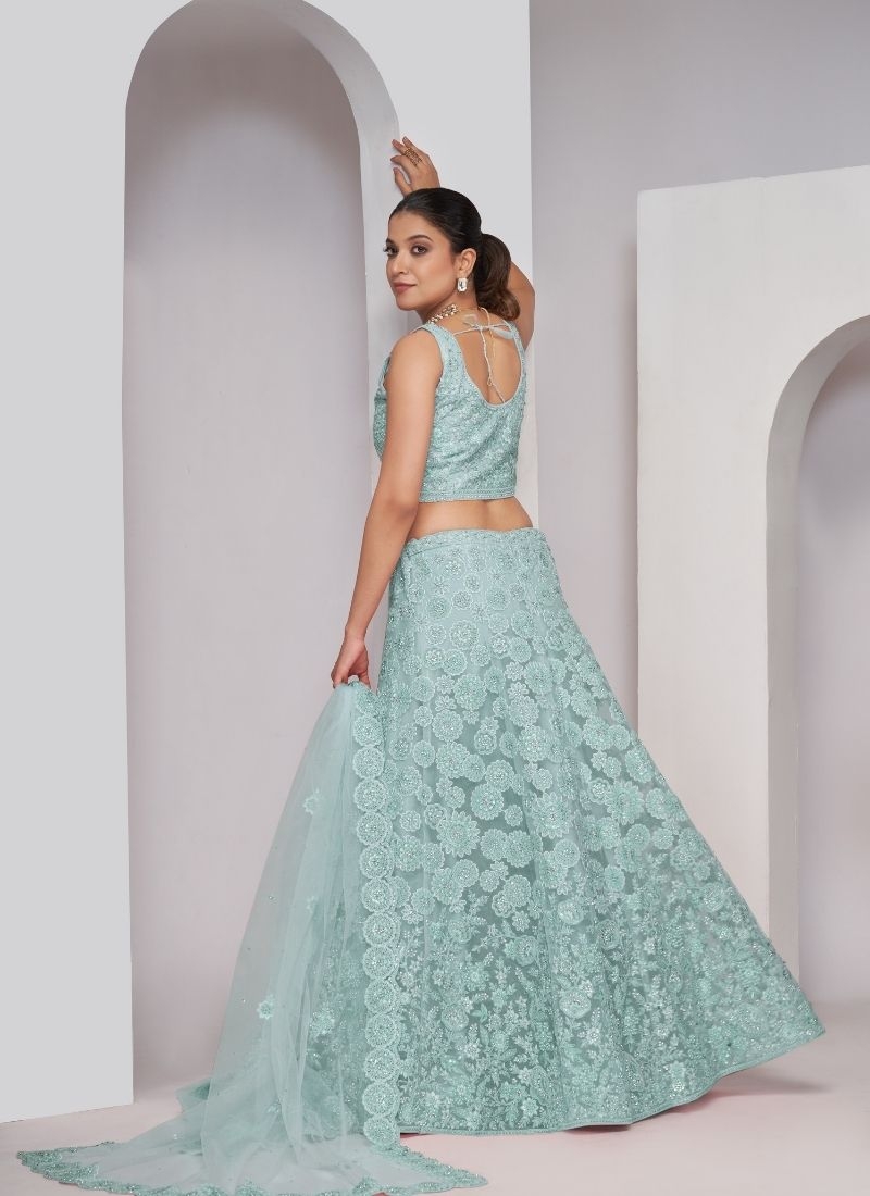 Girlish floral pattern thread and sequins work elegant lehenga in teal green