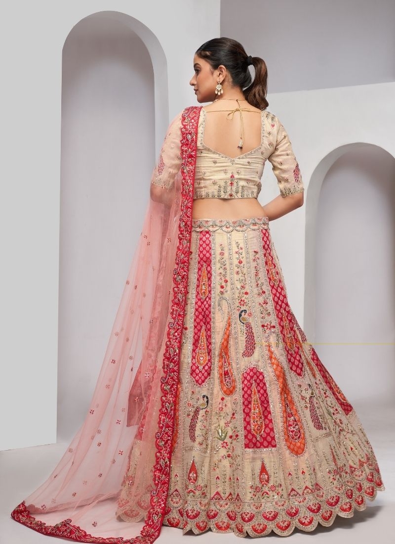 Elegant Peacock and Paisley motifs Silk traditional lehenga choli in cream