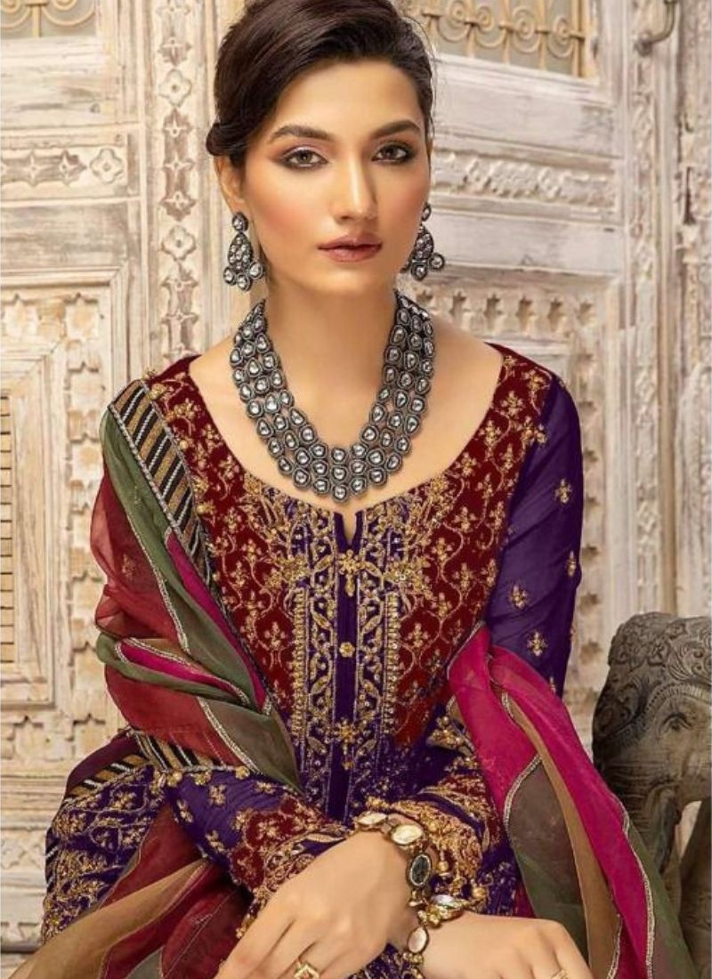 Beautiful embroidered georgette palazzo suit in dark purple