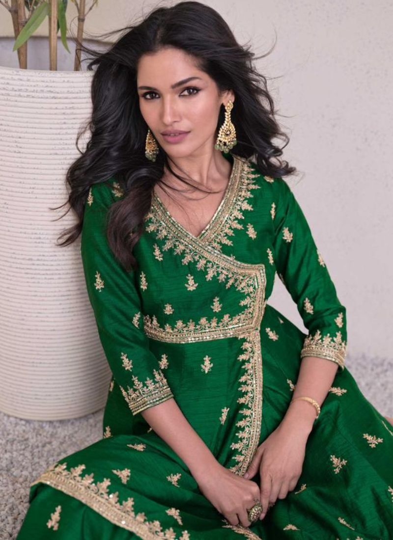 Beautiful pearl embroidered silk sharara suit in dark green