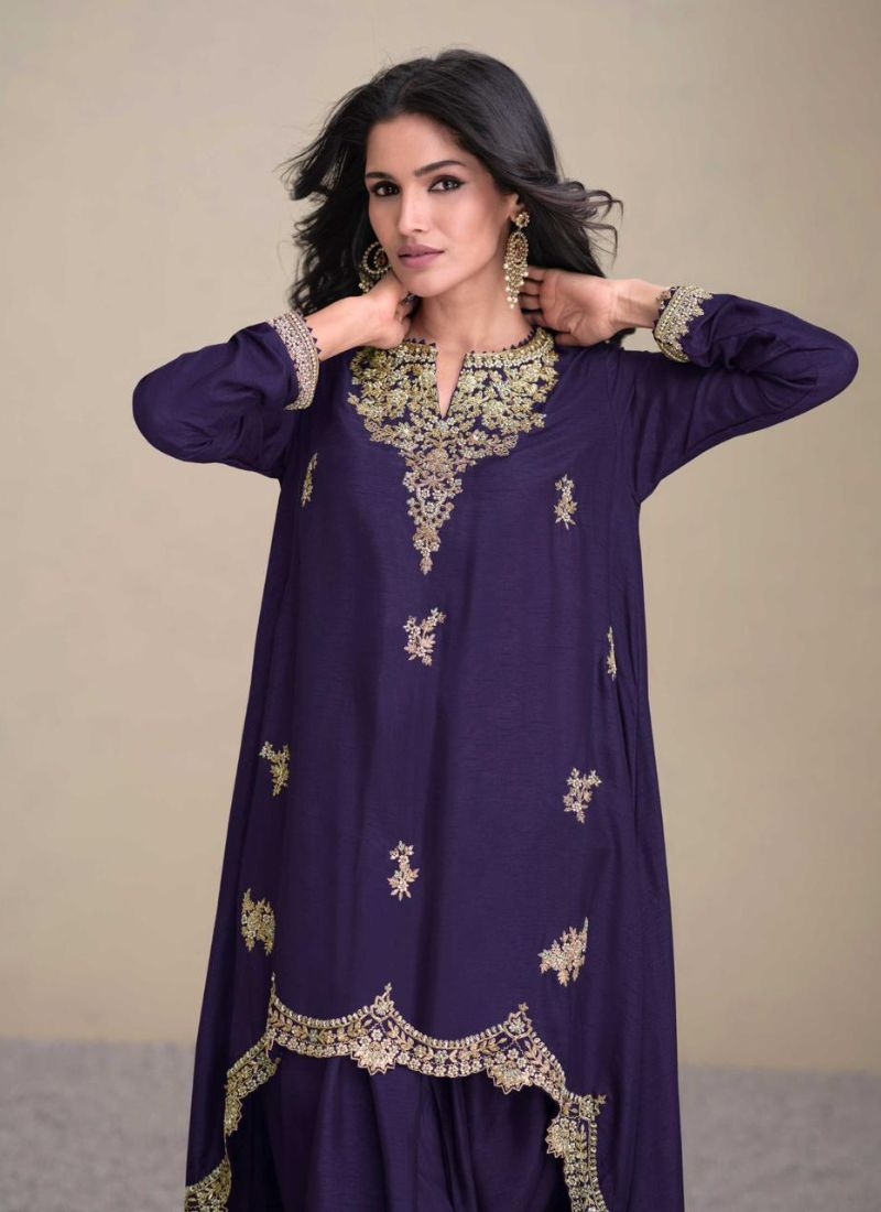 Beautiful pearl embroidered silk salwar suit in dark purple