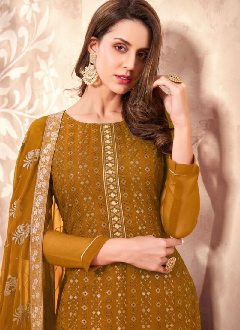 Beautiful embroidered georgette pant suit in mustard