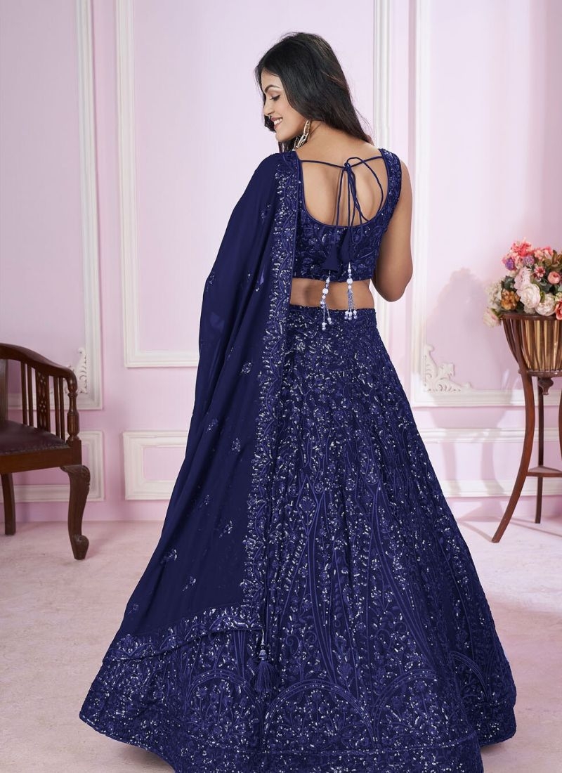 Exquisite embroidered georgette lehenga choli with net dupatta in navy blue