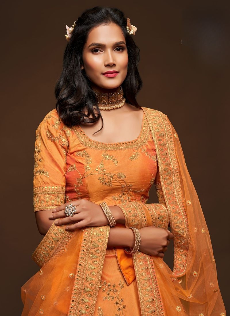 Beautiful embroidered georgette lehenga choli in orange