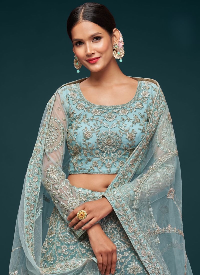 The gorgeous embroidered net lehenga choli in light green