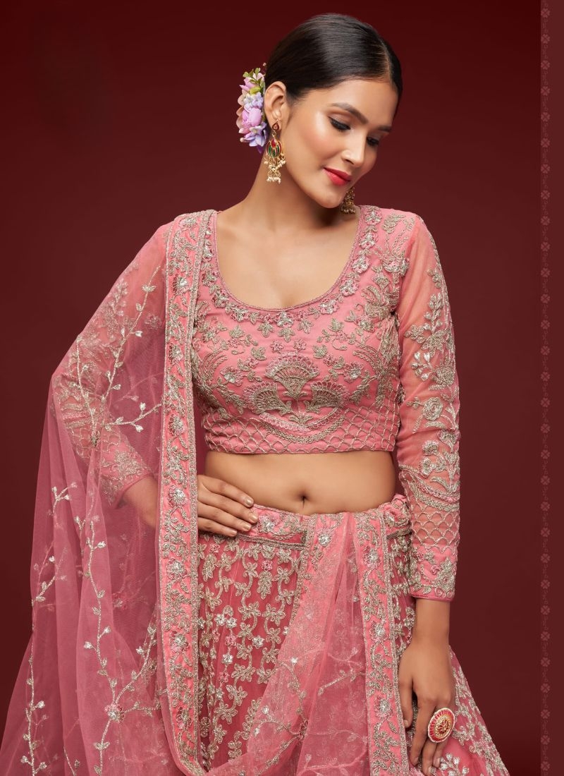 The gorgeous embroidered net lehenga choli in pink