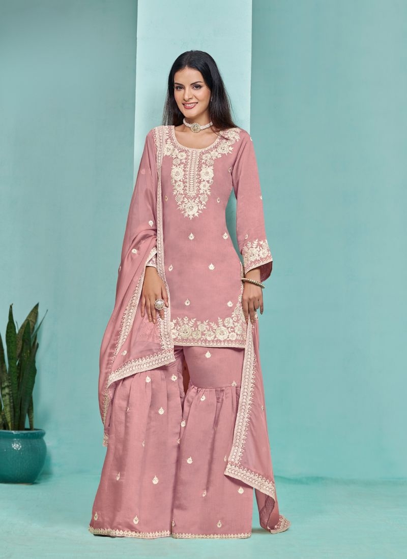 Stunning heavy embroidered sharara suit in peach pink