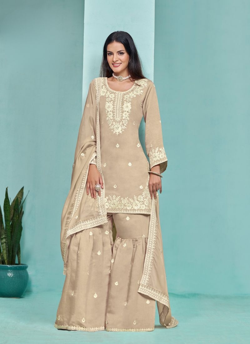 Stunning heavy embroidered sharara suit in beige