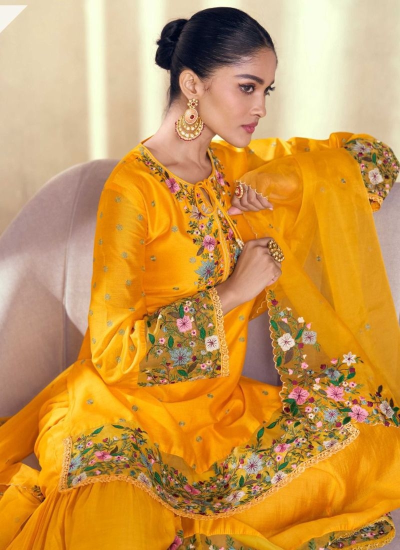 Exquisite embroidered premium silk sharara suit in yellow