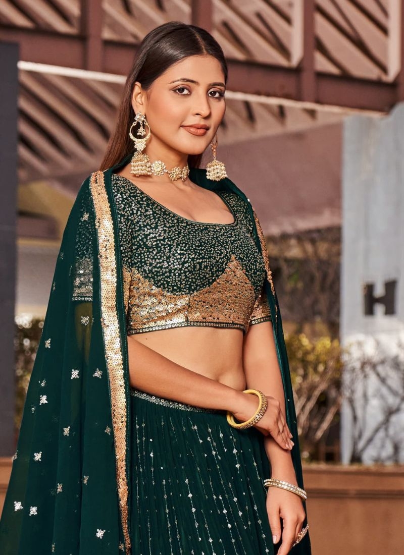 Stunning embroidered georgette lehenga choli in dark green