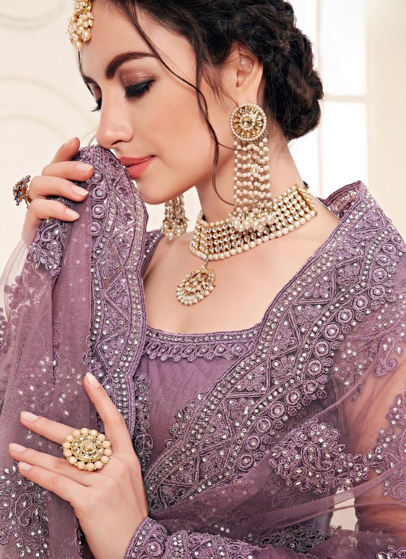 Gorgeous embroidered wedding lehenga choli in purple