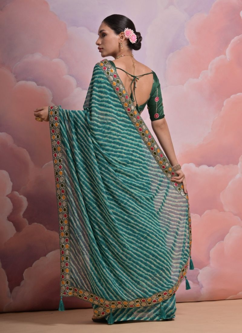 Beautiful embroidered georgette saree in green