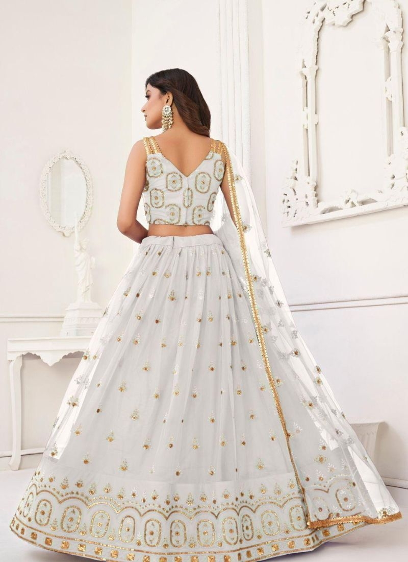 Stunning embroidered net lehenga choli in white