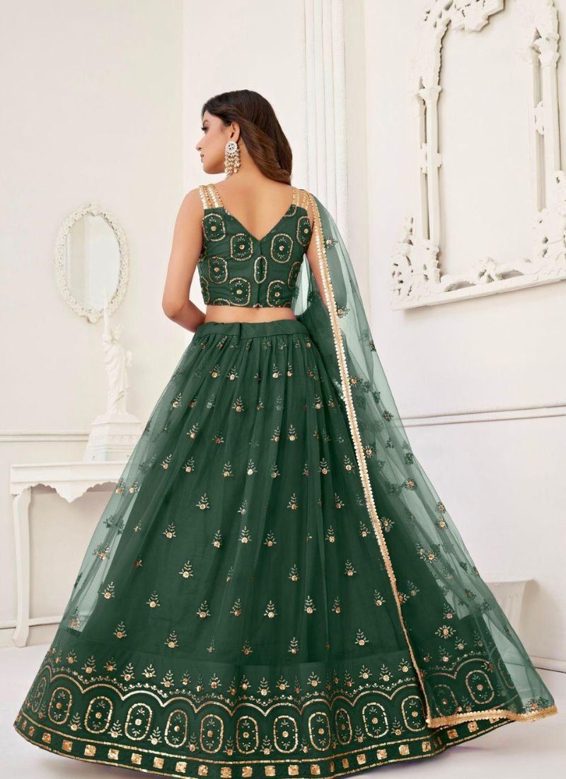 Stunning embroidered net lehenga choli in green