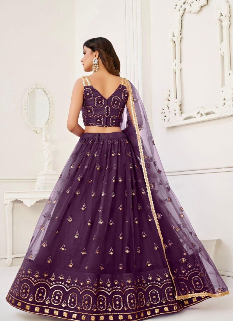 Stunning embroidered net lehenga choli in purple