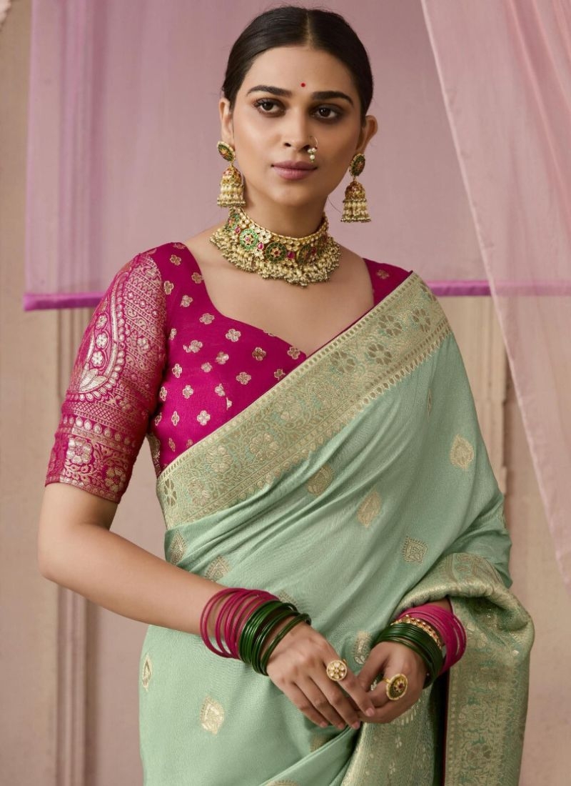 Exquisite dola silk saree with meenakari weaving in light green