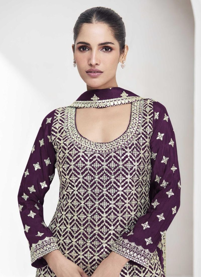 Exquisite thread embroidered sharara suit in dark purple