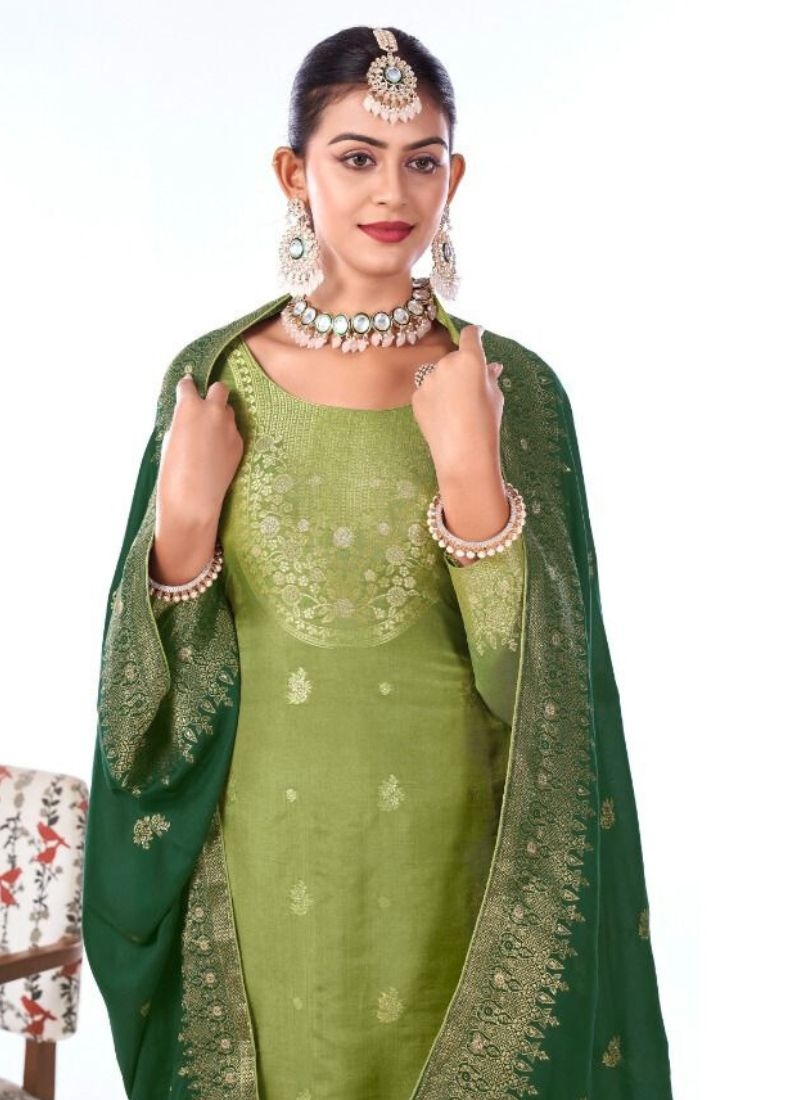 Stunning pure muslin jacquard printed kurta pant suit in green