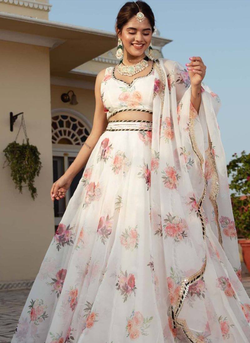 Beautifully embroidered organza silk lehenga choli in white