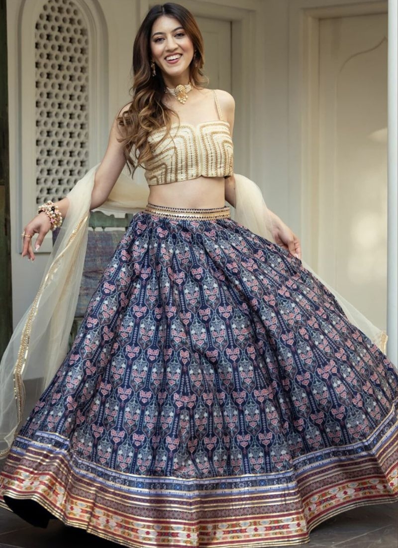 Beautifully embroidered organza silk lehenga choli in blue