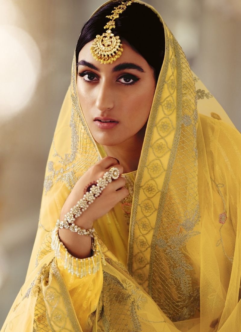 Designer patch embroidered georgette sharara suit in yellow