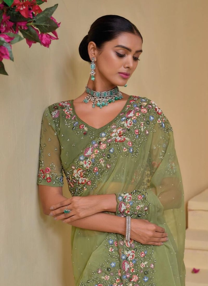 Stunning Heavy embroidered pure silk saree in light green