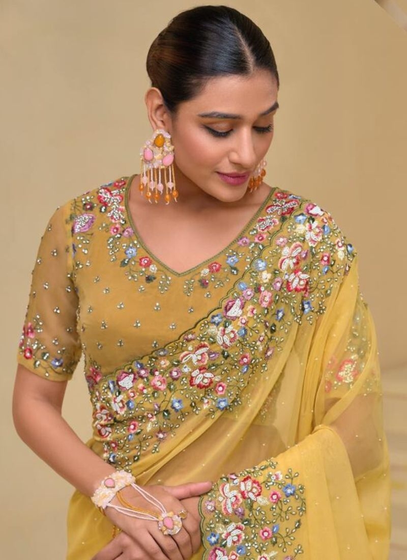 Stunning Heavy embroidered pure silk saree in yellow