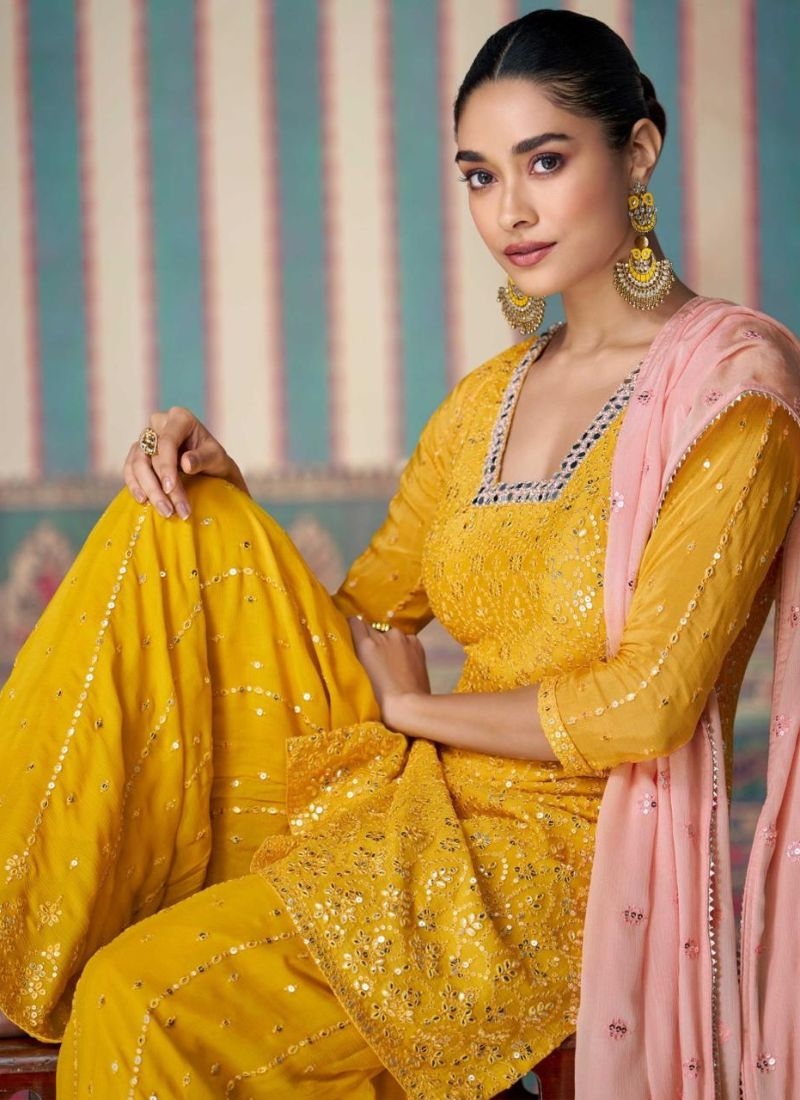 Designer heavy embroidered chinon silk sharara suit in yellow