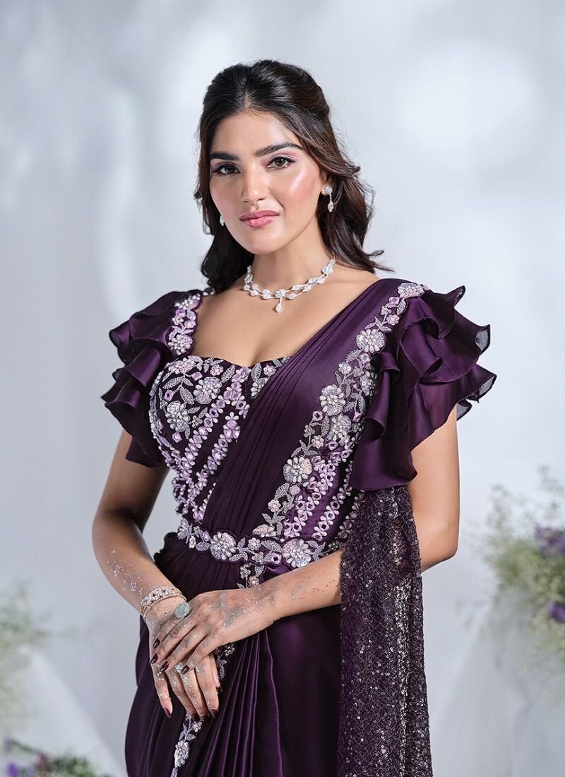 Designer thread and stone embroidered silk saree in purple