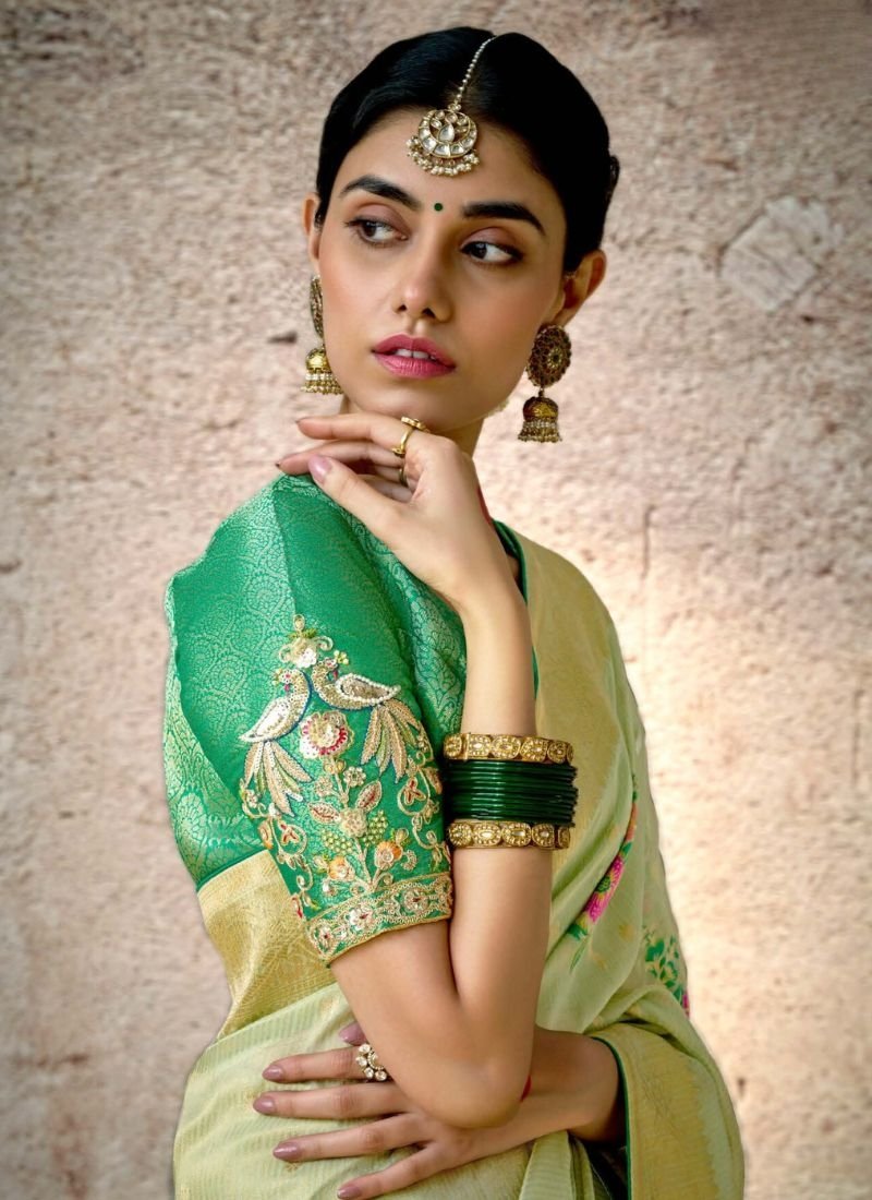 Stunning embroidered banarasi silk saree in light green