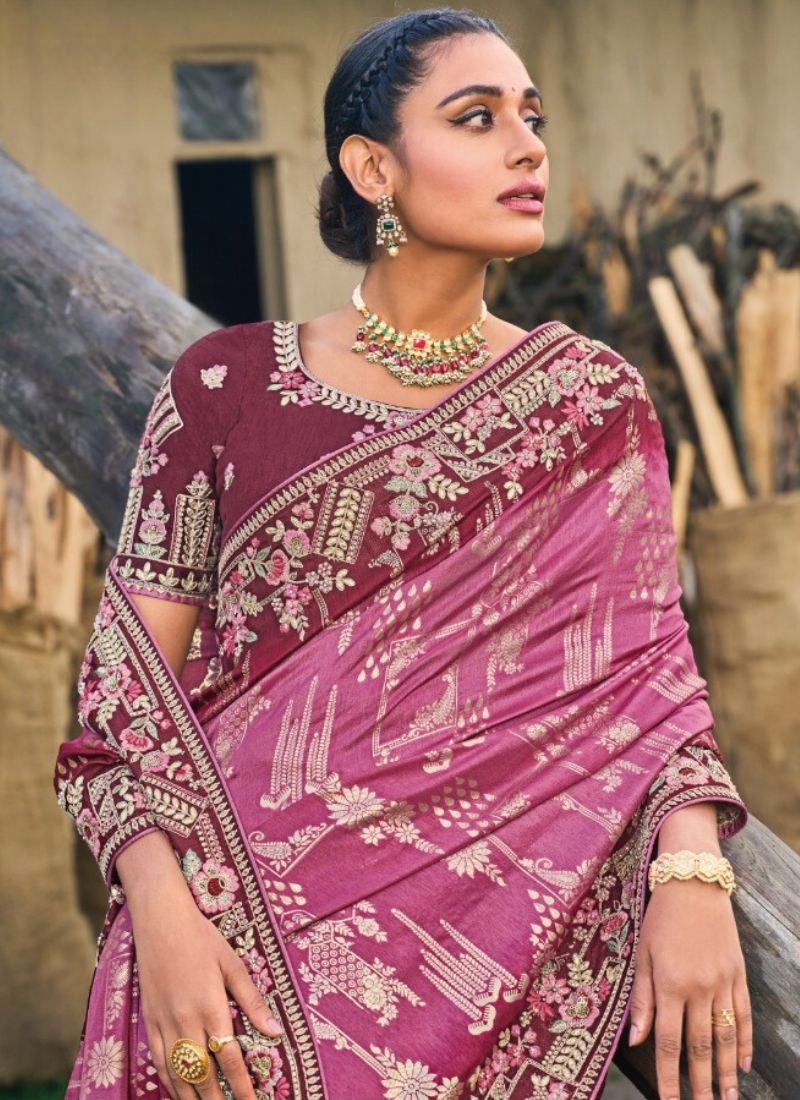 Beautiful hand embroidered organza silk saree in maroon