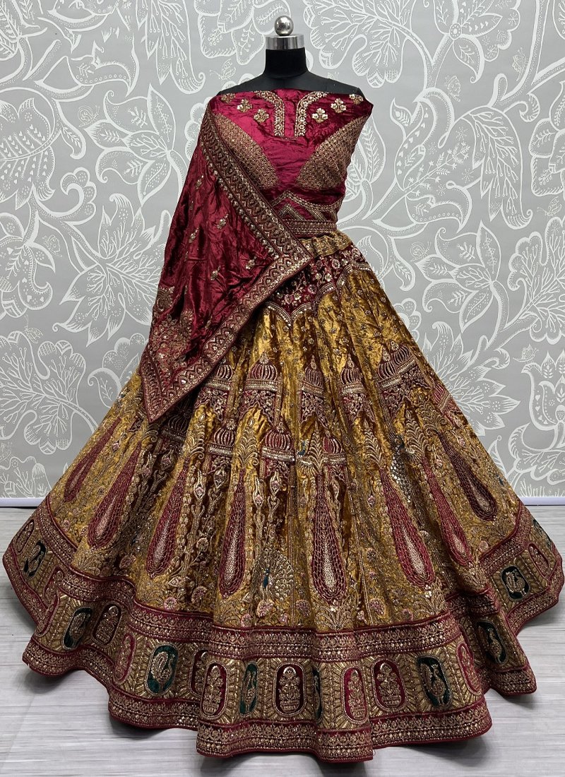 Bridal heavy embroidered soft velvet lehenga choli in yellow