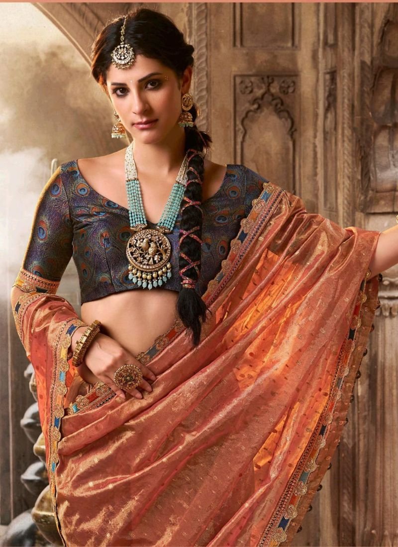 Elegant hand woven tissue silk saree in orange