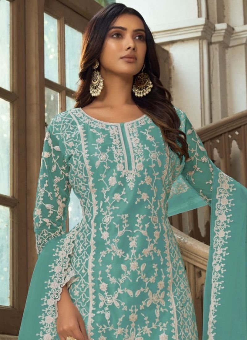 Beautiful heavy embroidered butterfly net kurta palazzo suit in light green