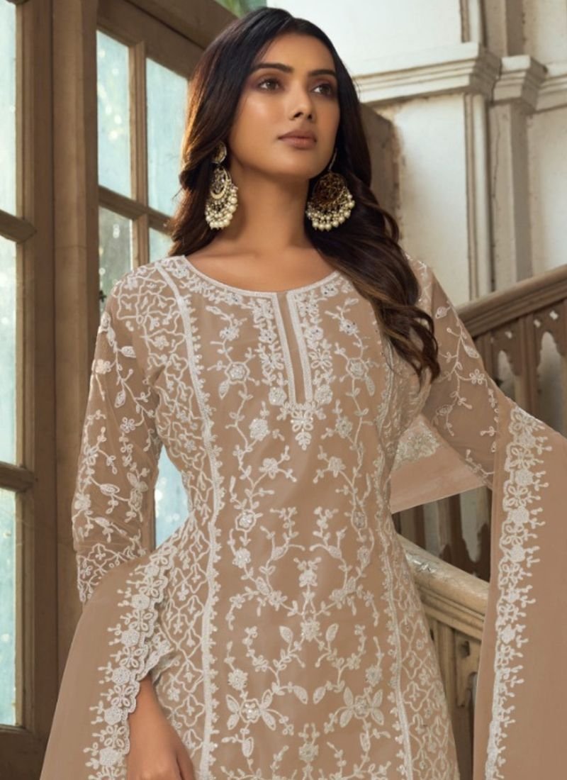 Beautiful heavy embroidered butterfly net kurta palazzo suit in beige