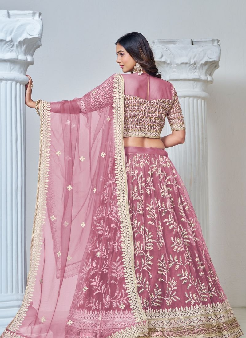 Exquisite heavy thread embroidered net lehenga choli in pink