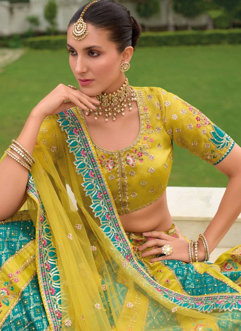 Beautiful printed embroidered silk lehenga in yellow