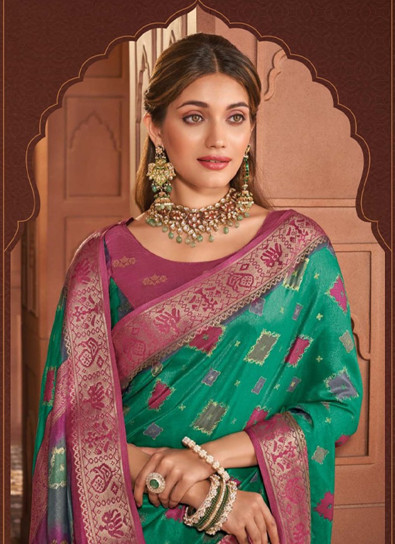 Elegant Jacquard Weave Soft Silk Saree in dark green