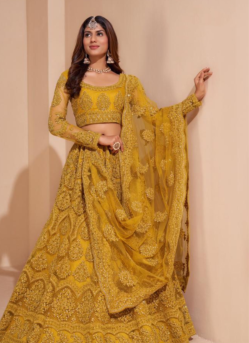 Sequins embroiderd acrylic net lehenga choli in Yellow