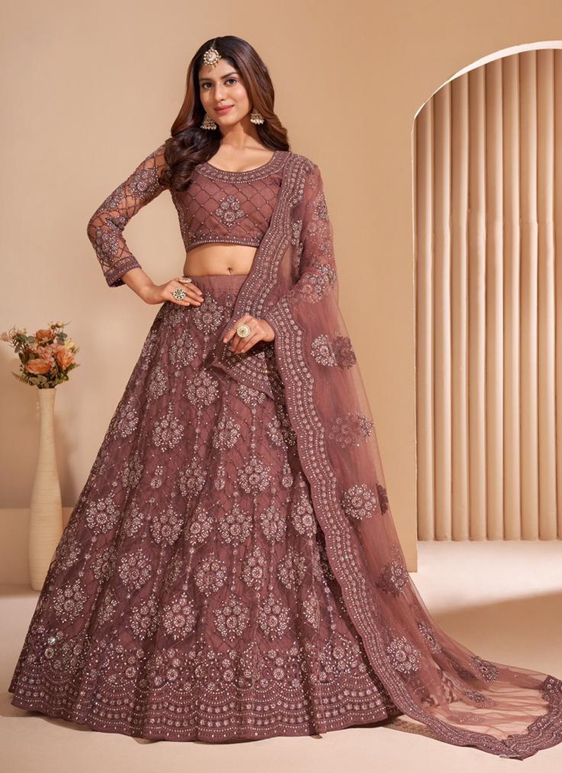 Sequins embroiderd acrylic net lehenga choli in Dusky rose