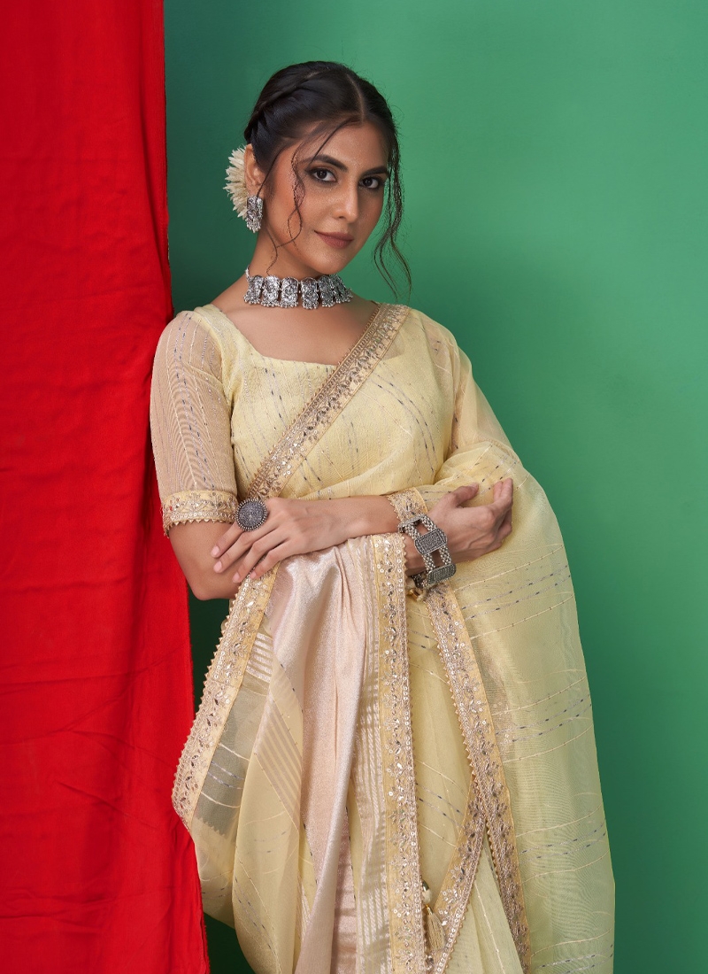 Traditional gotta patti saree with beautiful embroidery in Light Yellow