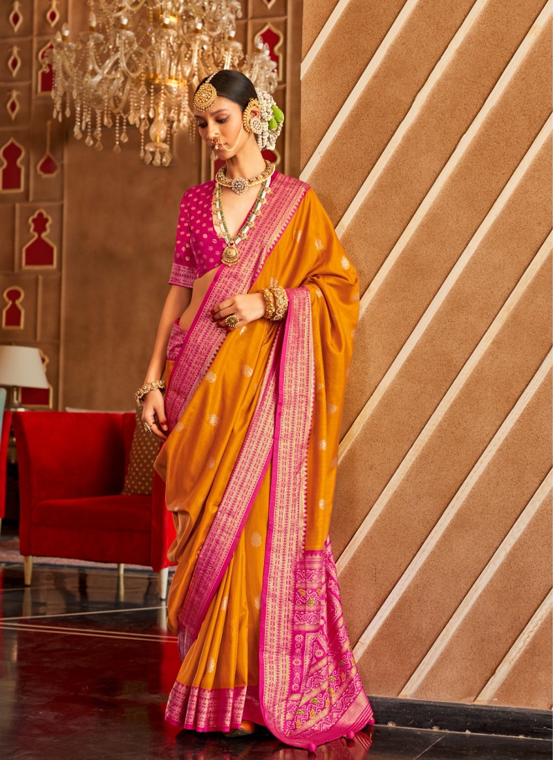 Traditional and designer silk saree in orange